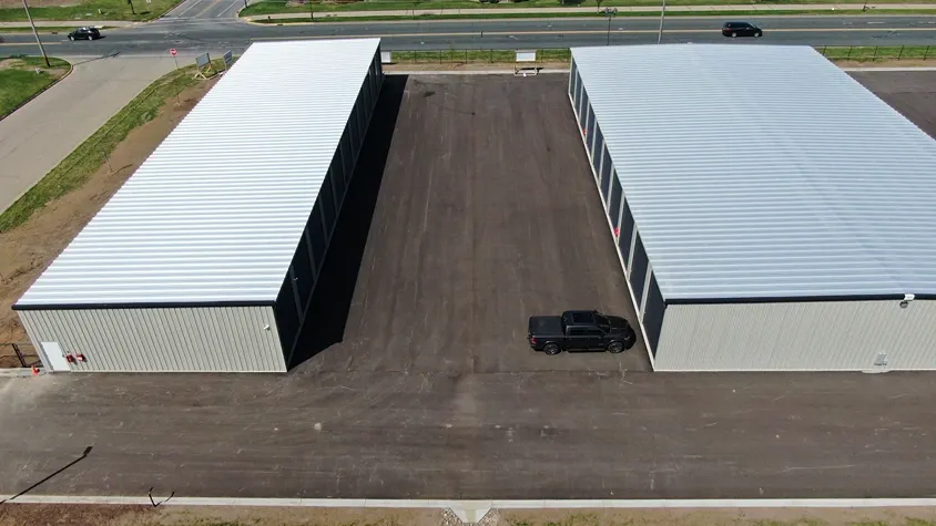 Aerial view of facility with drive up units