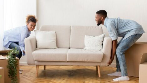 A couple moving their couch