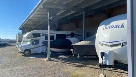 Covered vehicle parking for campers, boats, and RVs.