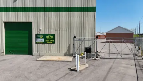 Aerial view of the Five Star Storage facility on Marshall Avenue in St. Paul, Minnesota, displaying the layout of the storage units, parking area, and surrounding neighborhood with residential buildings and trees.