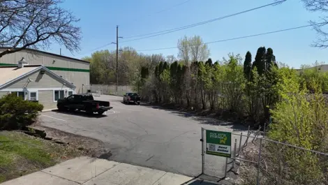 Drone shot capturing a wide view of the Five Star Storage facility in St. Paul, Minnesota, highlighting the entire property, surrounding streets, and neighborhood with houses and greenery.